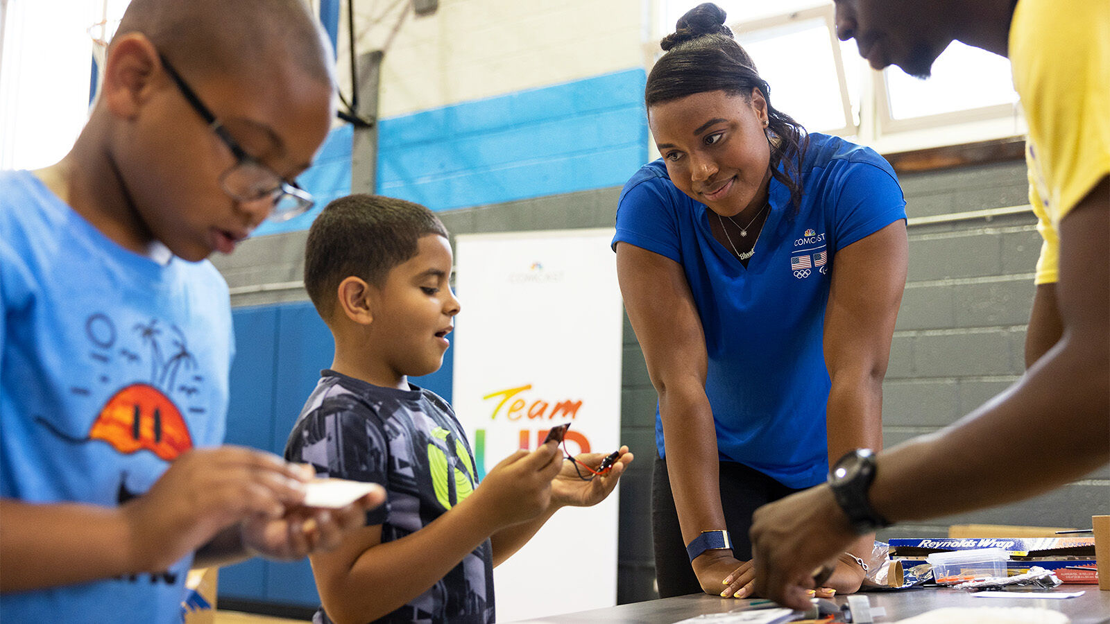 Comcast volunteers participate in Easterseal’s toy modification workshop as part of Team UP.