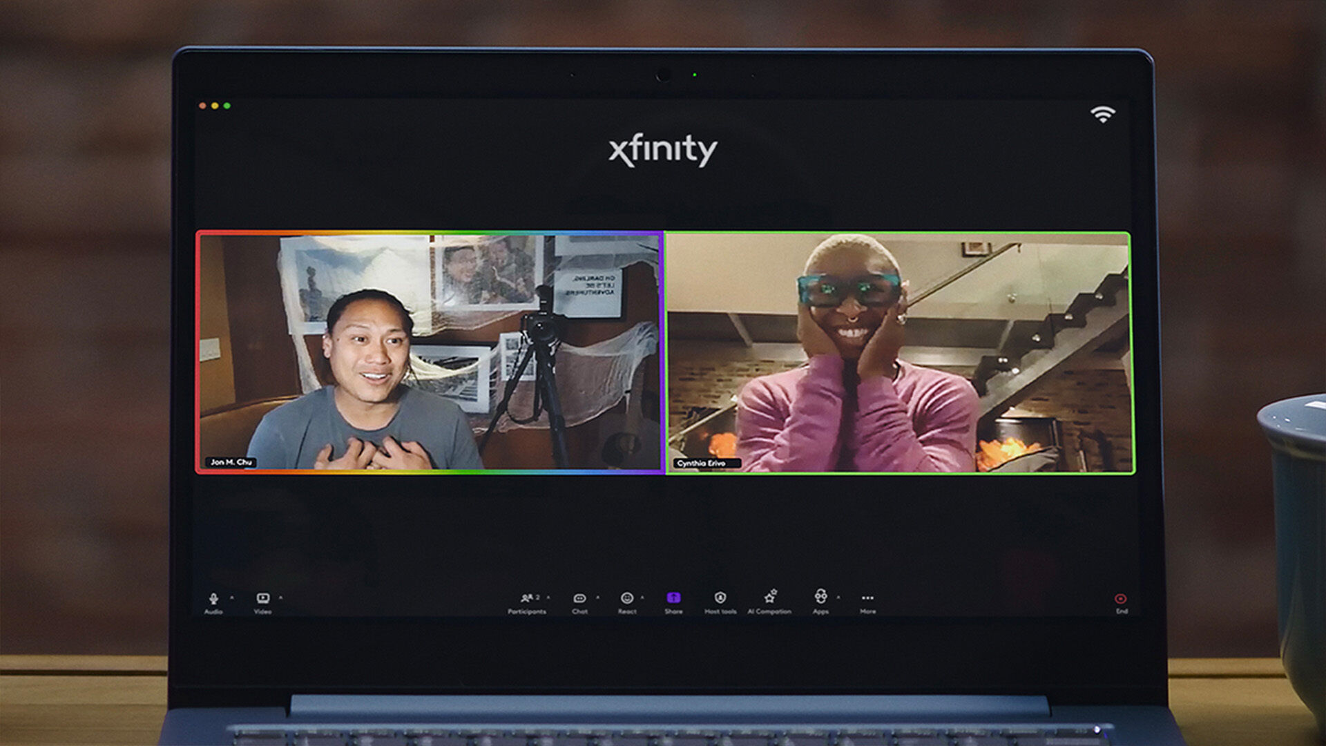 Jon Chu and Cynthia Erivo displayed on a computer screen during a video call.