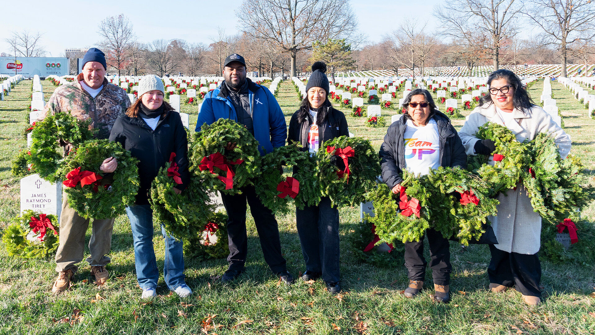 Comcast VetNet members gather at Arlington National Cemetery for Wreaths Across America 